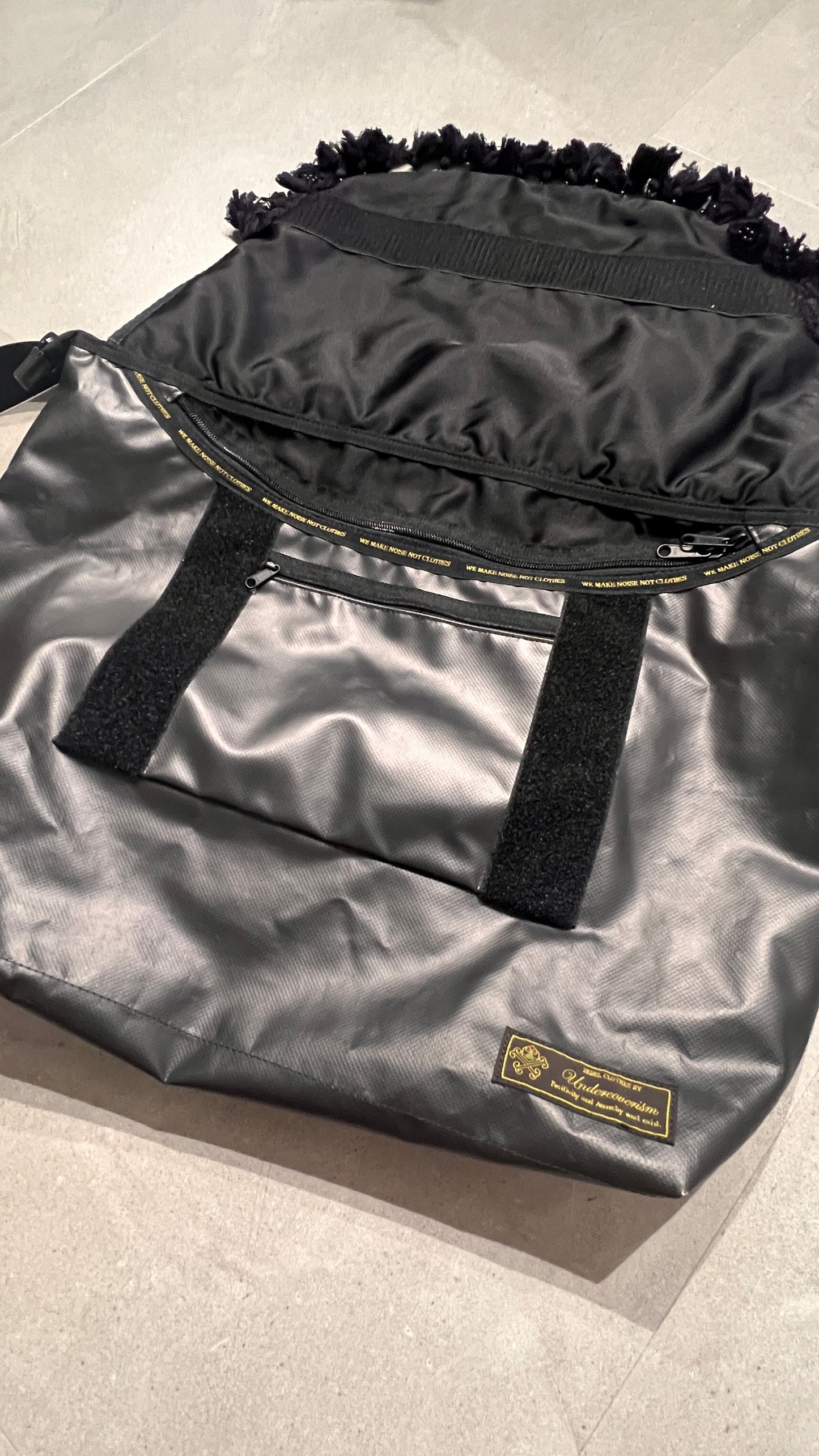 SS09 Undercover “Grace” Tribal Coin Messenger Waterproof Bag