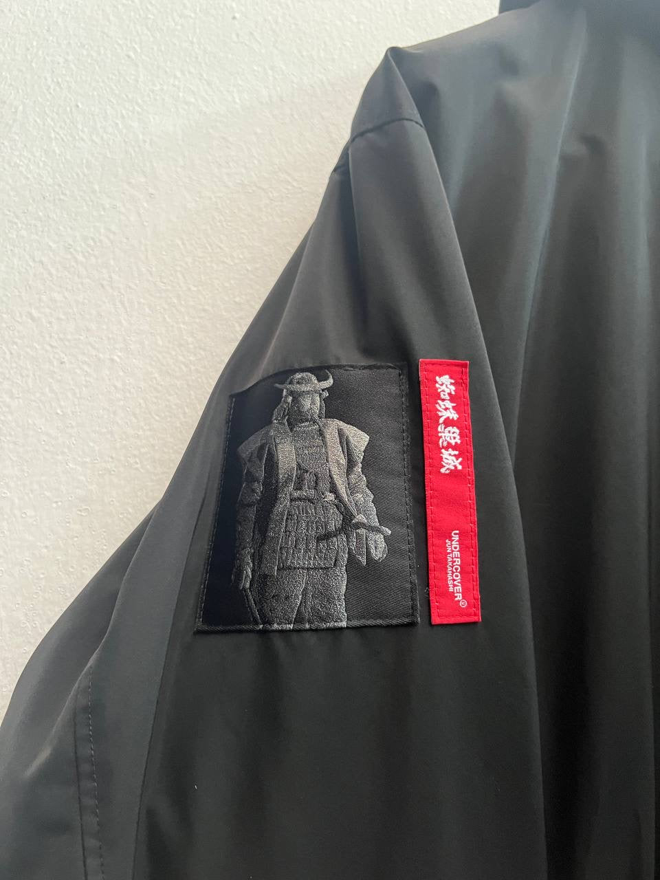 AW20 Undercover "Fallen Man" Throne of Blood Parka Jacket