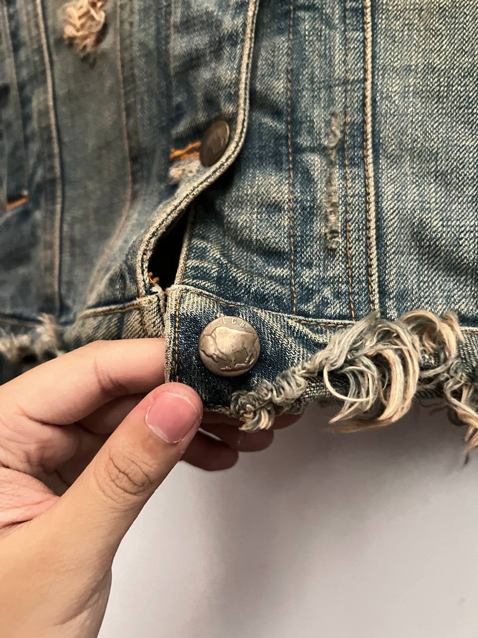Le Grand Bleu Distressed Denim Jacket